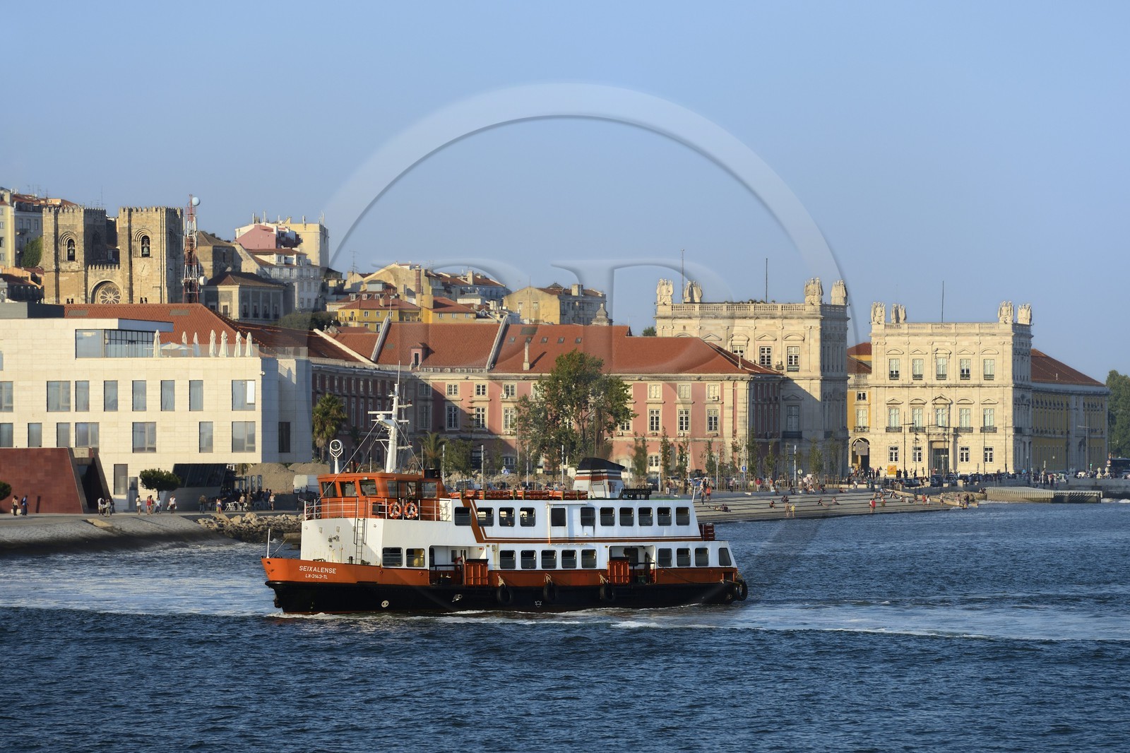 Portugal, Lisbon, ferry on the Tagus river (rio Tejo) and the historical center in the background