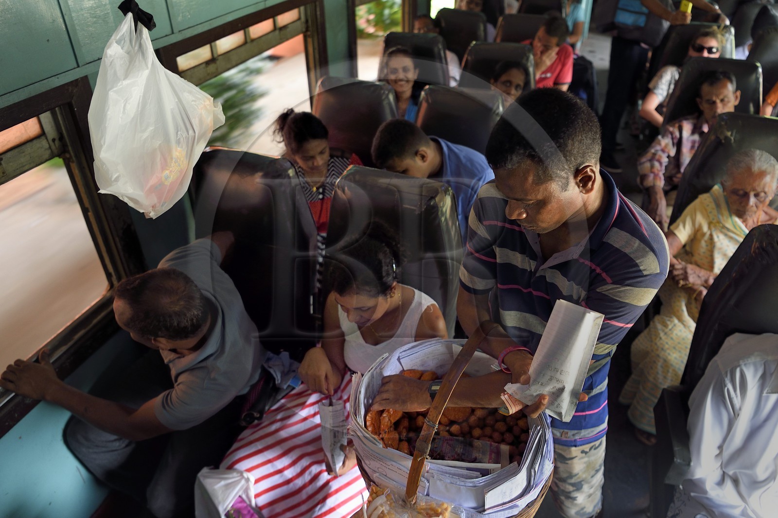 Sri Lanka, Southern Province, train from Galle to Colombo, fried shrimps and wade street vendor