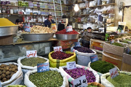 Iran, Isfahan Province, Isfahan, Bazar-e Bozorg (Great Bazaar), a massive covered bazaar which dates back almost 1300 years, stall of spices and dried vegetables