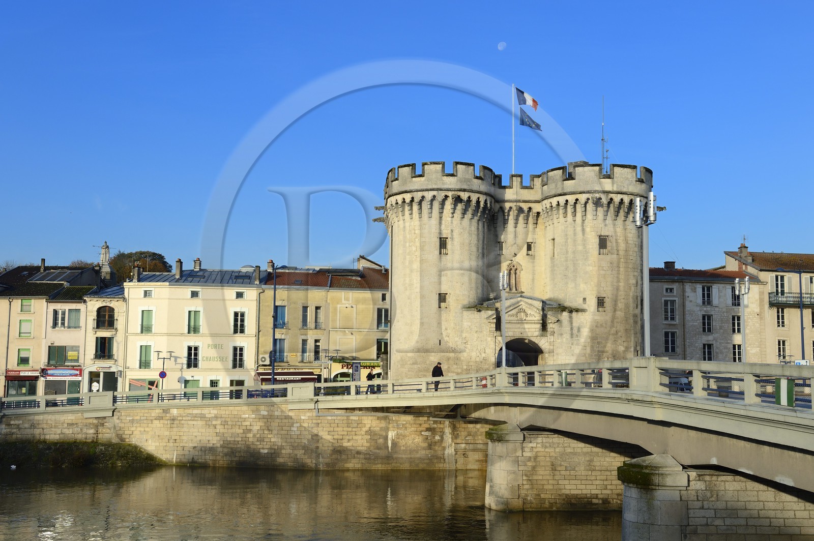 France, Meuse, Verdun, Porte Chaussee, gate of the 15th century, official entry of the city since its construction, defense tower of the great wall that encircled the city in the medieval seen from the Nation Place and the bridge over the Meuse River