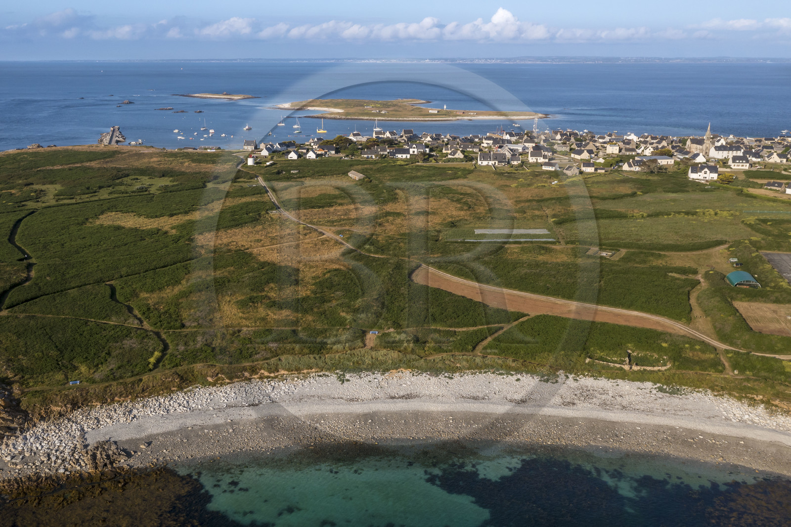 France, Finistère, Iroise Sea, Molene archipelago, Molene Island, Toul Bili beach, the town and the Lédenez Vraz islet in the background (aerial view)