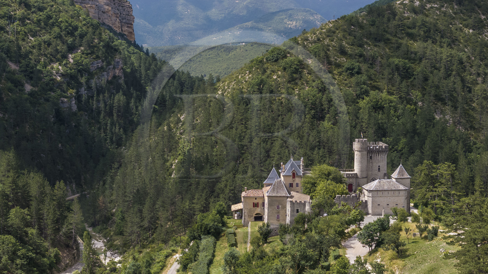 France, Drome, regional natural park of Baronnies provencales, Aulan, castle (12th century rebuilt 19th century), the Aulan gorges alongside the Toulourenc river (aerial view)
