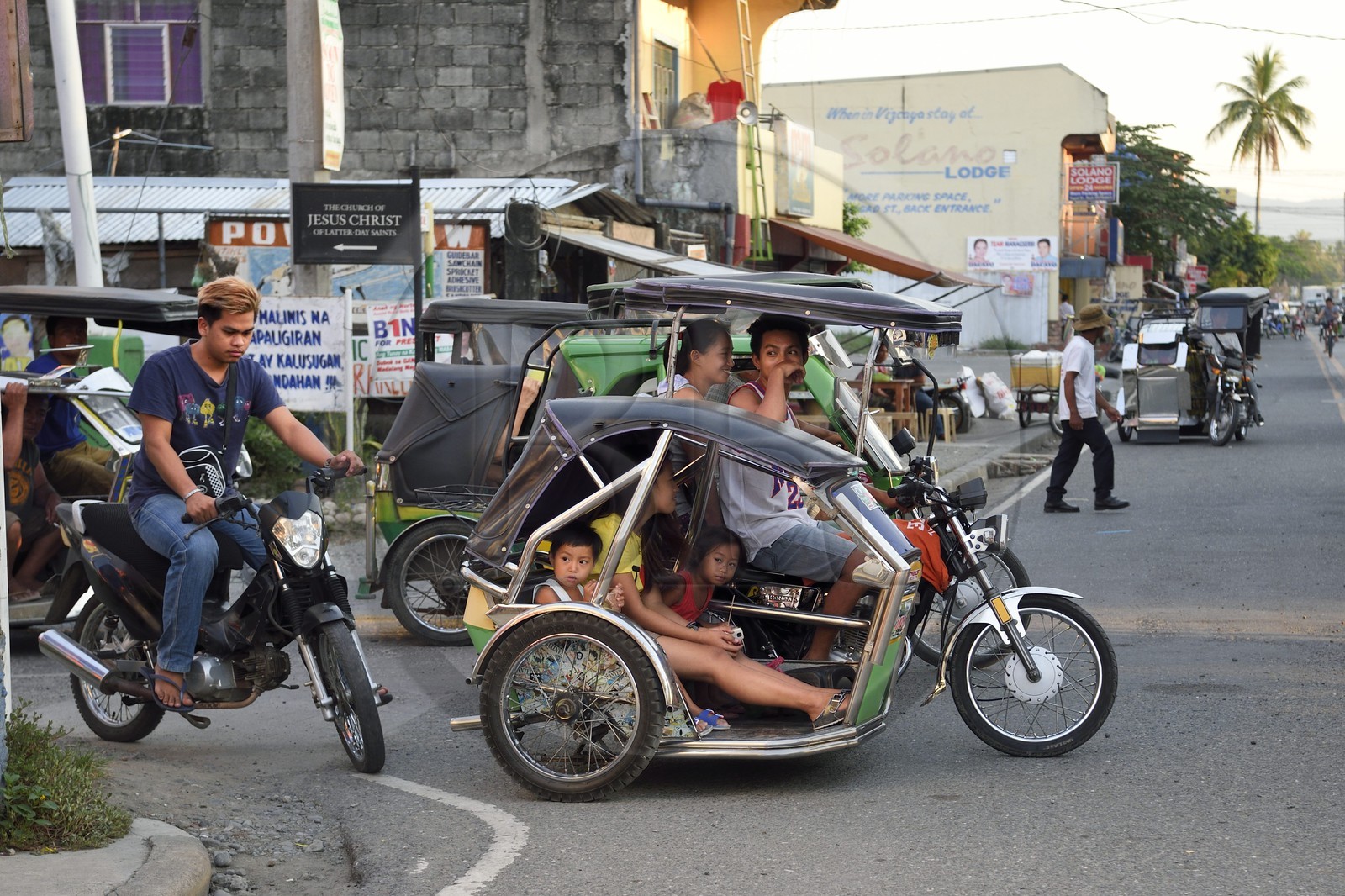 Philippines, province of Nueva Ecija, Bambang, tricycle motorcycle taxi in main street