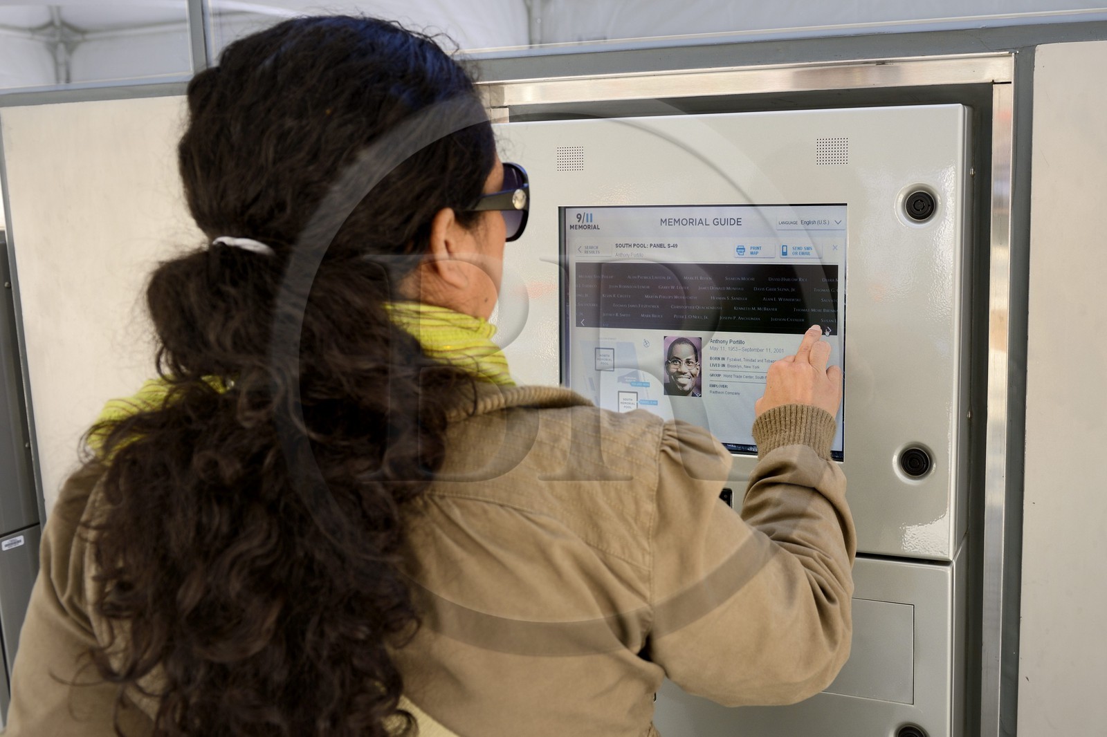 United States, New York,  Manhattan, 9 11 Memorial, location of victim names engraved on the edge of ponds on an interactive terminal