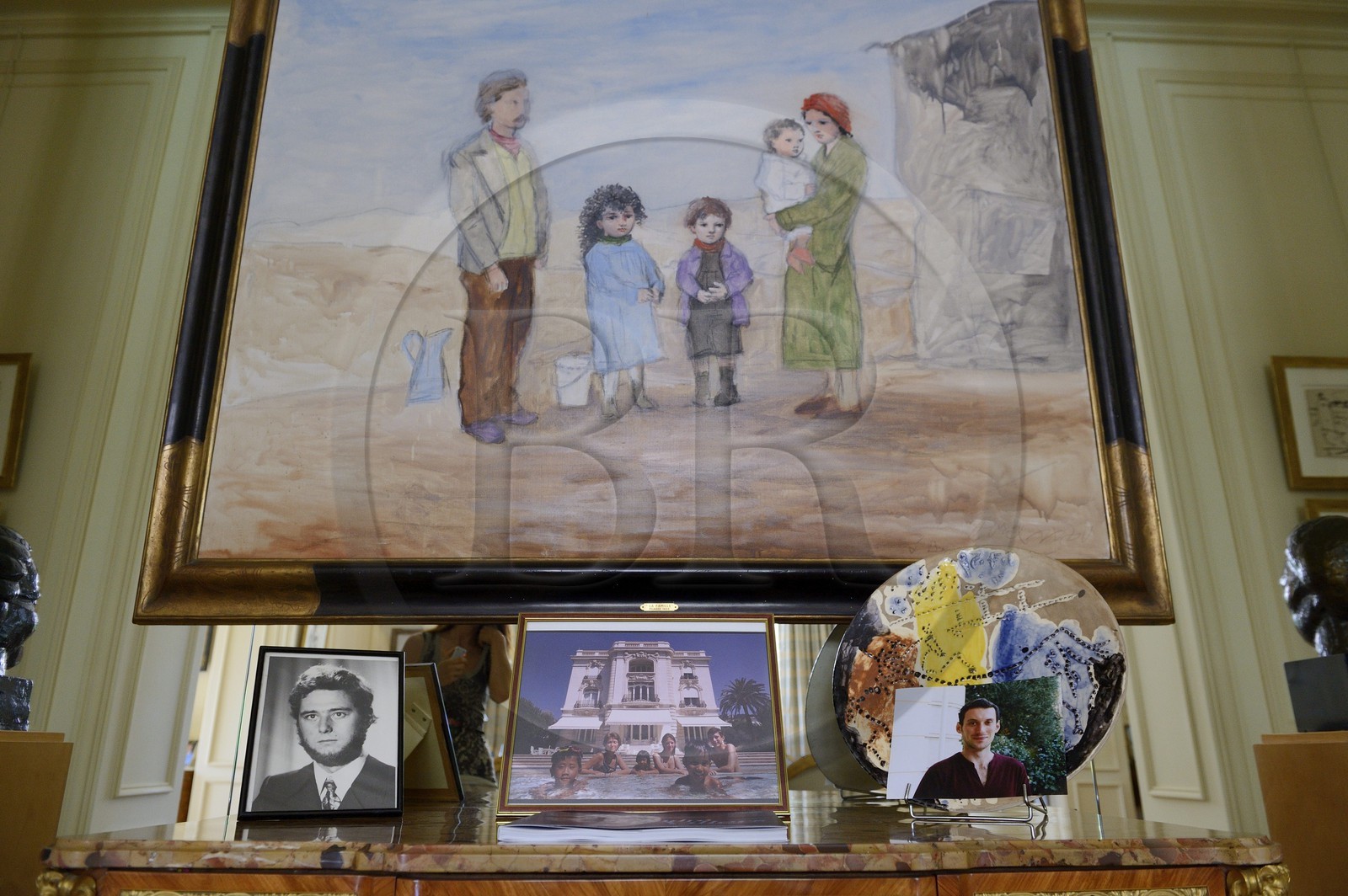 France, Alpes Maritimes, Cannes, the Villa La Californie where Picasso lived, today renamed the Pavillon de Flore by Marina Picasso, the living room, painting by Pablo Picasso entitled the Family and underneath family pictures of Marina Picasso