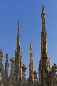 Italy, Lombardy, Milan, the Duomo in the historical center, cathedral in Gothic Flamboyant style, spires topped by statues
