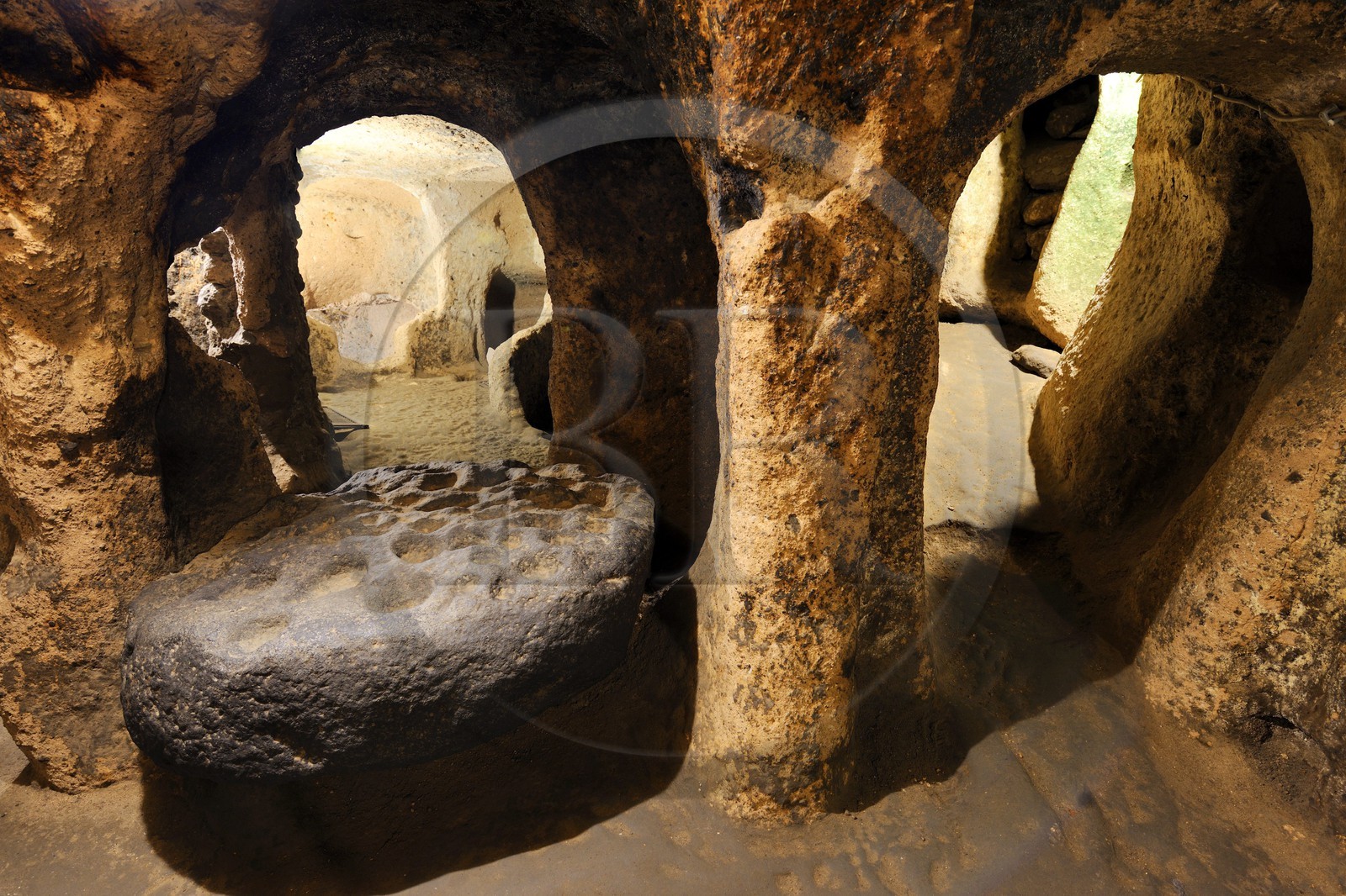 Turkey, Central Anatolia, Nevsehir Province, Cappadocia listed as World Heritage by UNESCO, Kaymakli underground town on eight levels, basalt stone used as a mortar and barricade door