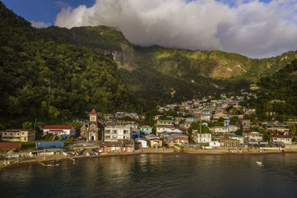 Caribbean, Dominica Island, Soufriere Bay, the beach and the village of Soufriere (aerial view)