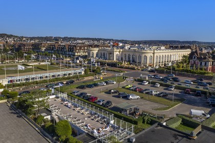 France, Calvados, Pays d'Auge, Deauville, the Casino Barriere de Deauville and the Thalassotherapy center in the foreground