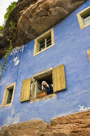 France, Bas Rhin, Parc regional des Vosges du nord (Northern Vosges Regional Natural Park), Eschbourg, Maisons des Rochers (Rocks houses) of Graufthal, semi-troglodytic houses of the 18th century and inhabited until 1958, the former village teacher Annette Oster
