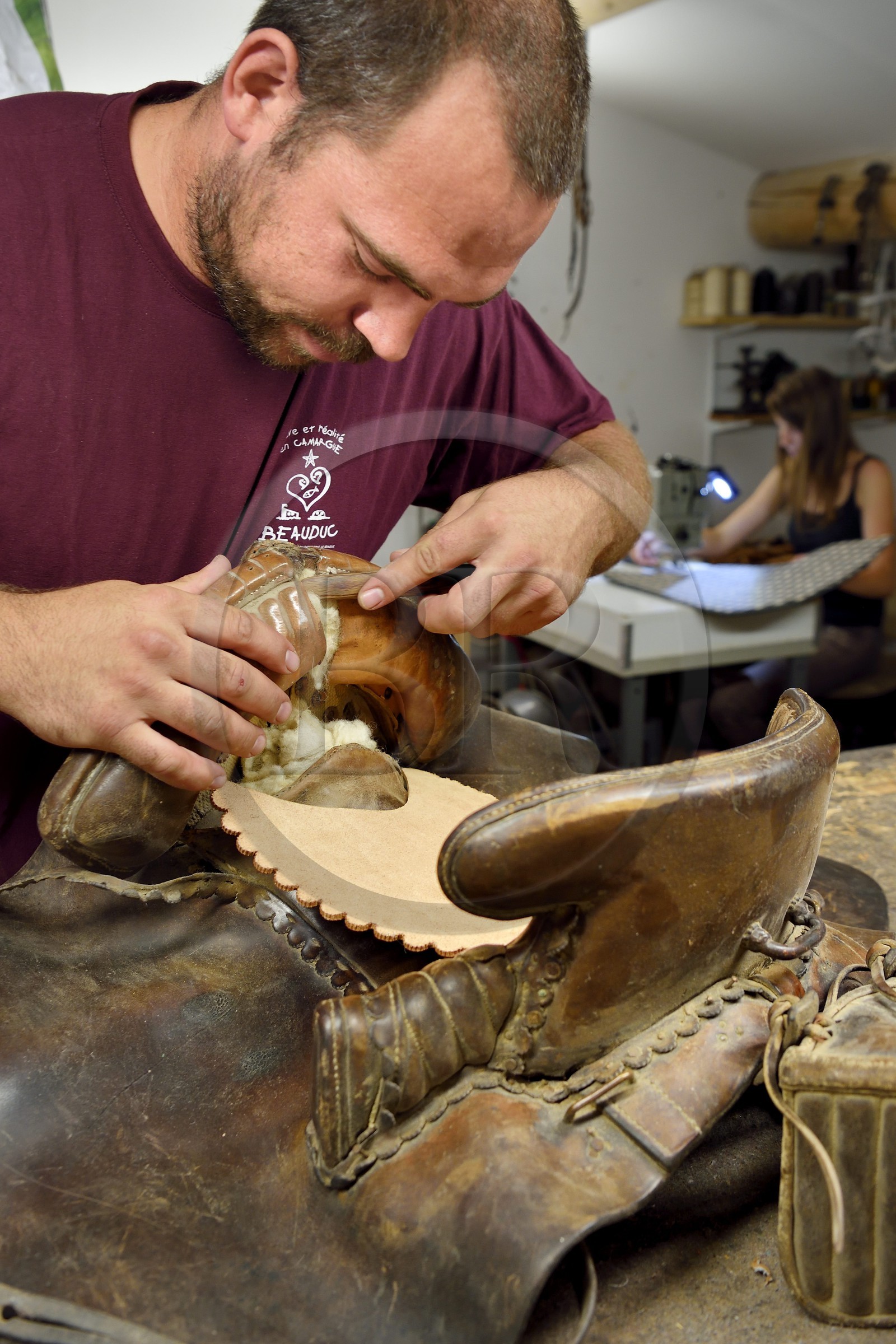France, Gard, Fourques, Victor Mailhan saddlery and harness manufacturing in his workshop, saddle of camarguais gardian