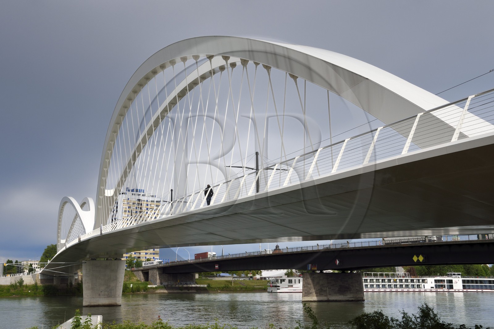 France, Bas Rhin, Strasbourg, the pedestrian, bicycle and the tram line D bridge over the Rhine river connecting Strasbourg to Kehl in Germany inaugurated on 28 April 2017 called Beatus Rhenanus bridge