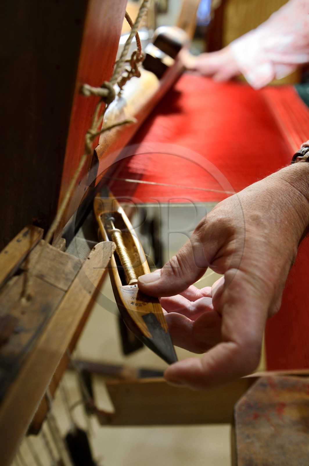 France, Rhone, Lyon, historical site listed as World Heritage by UNESCO, Vieux Lyon (Old Town), Saint George district, Jacquard loom at the silk trade (Soierie) Saint-Georges, shuttle for the passage of gold wire