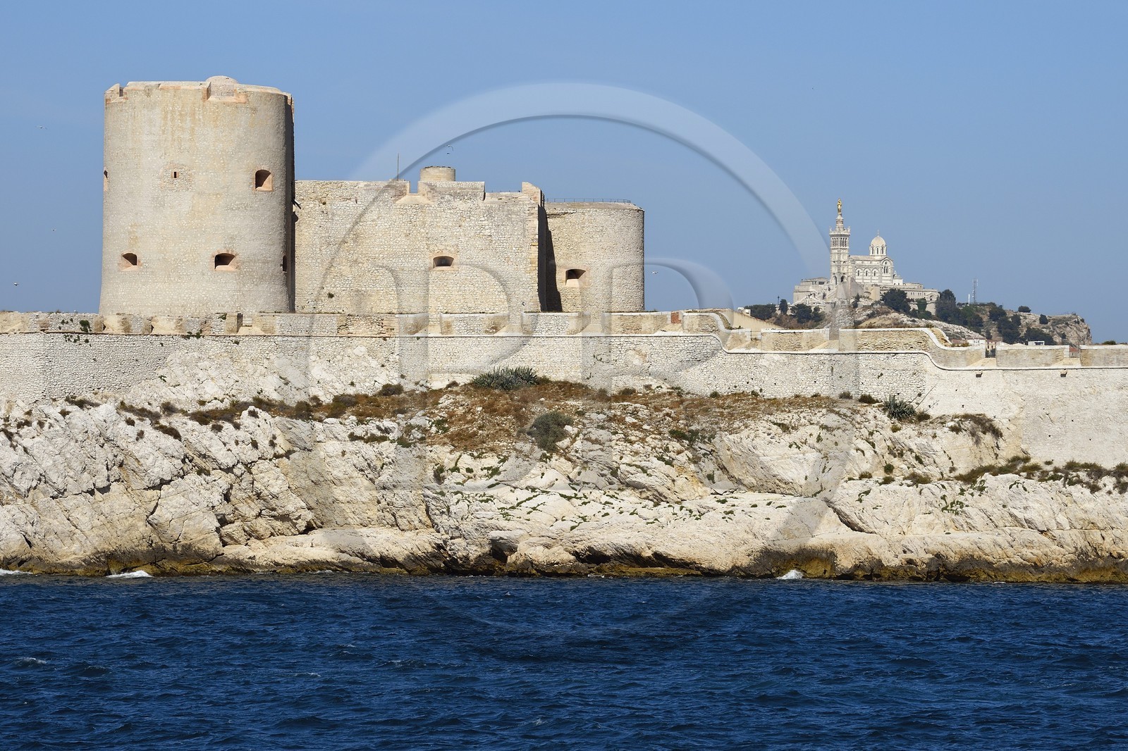 France, Bouches du Rhone, Marseille, Calanques National Park, archipelago of Frioul islands, the Chateau d'If and Notre Dame de la Garde basilica in the background