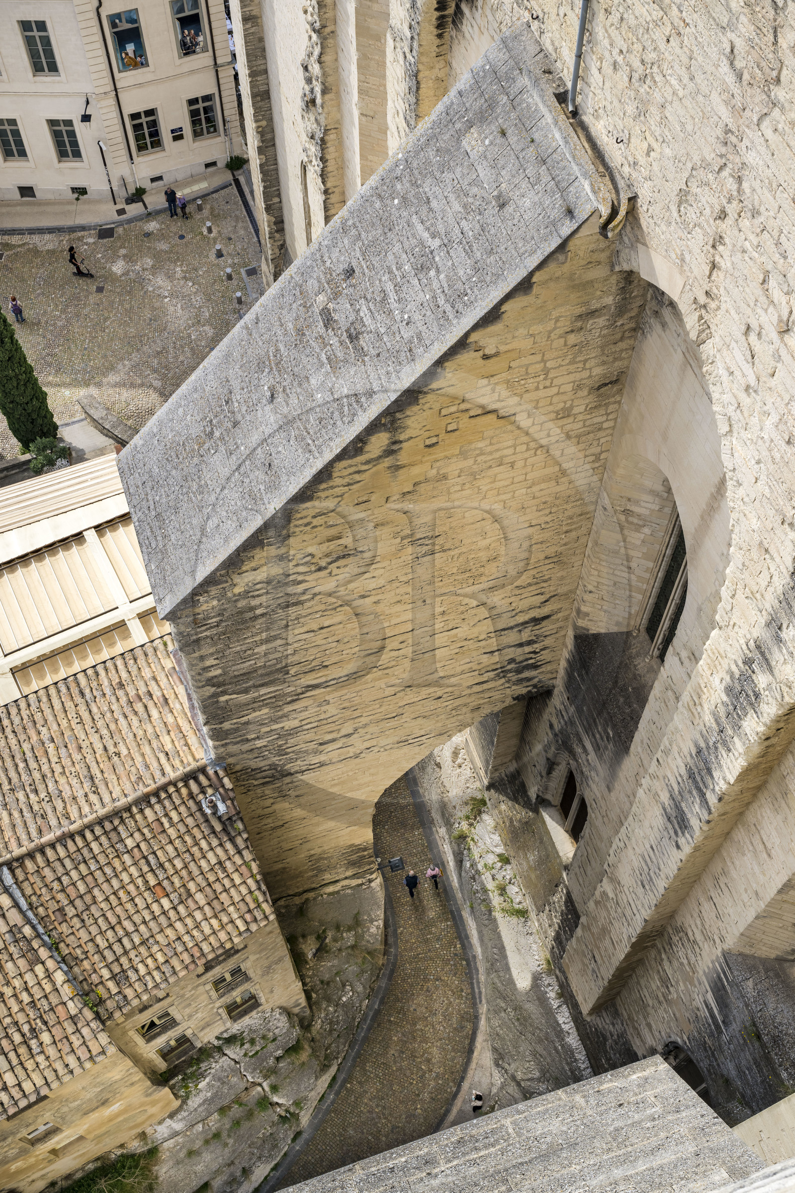France, Vaucluse, Avignon, the rue de la Peyrolerie, a passage dug into the rock at the foot of the Palais des Papes (Palace of the Popes) classified as UNESCO World Heritage