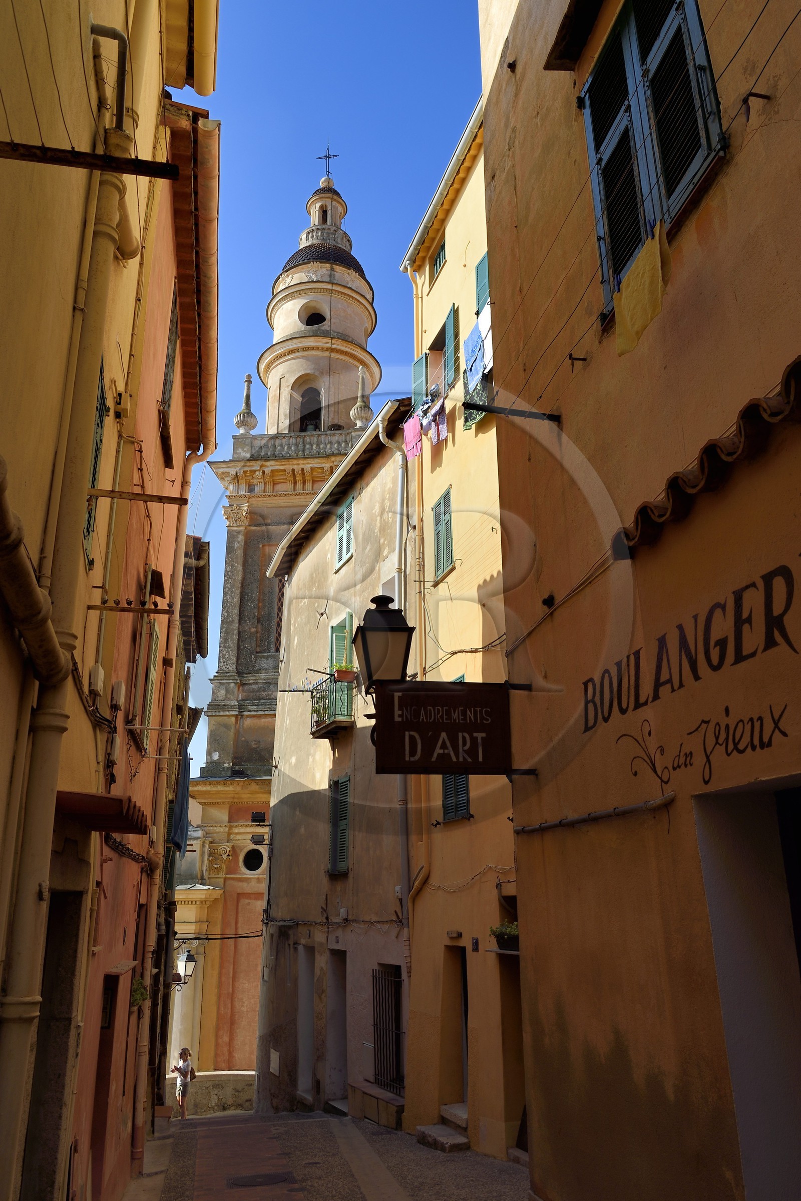 France, Alpes-Maritimes, Menton, old town, the St Michael Basilica bell tower and the rue du Vieux-Chateau