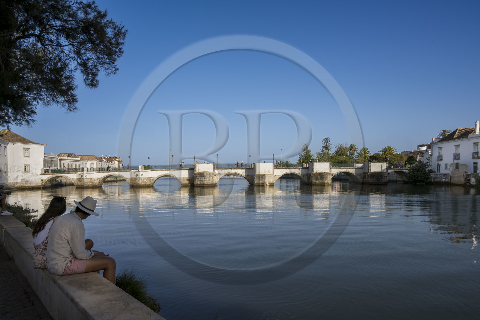 Portugal, Algarve, Tavira on the edge of the Ria Formosa Natural Park, the 12th century 7-arch Roman bridge over the Rio Gilao