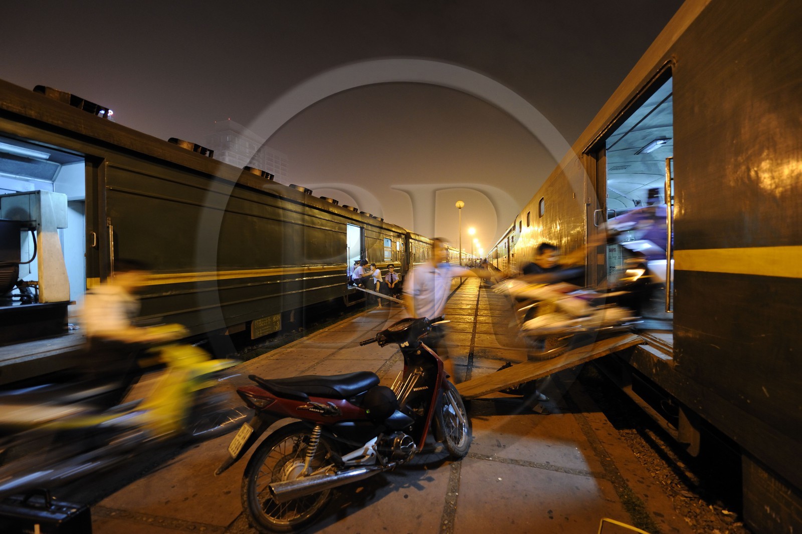 Vietnam, Hanoi, central train station, the motorbikes go into a dedicated wagon
