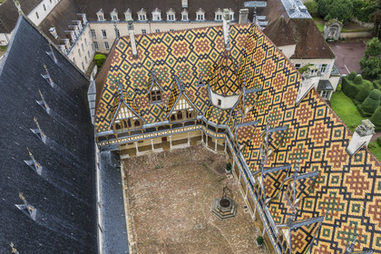 France, Cote d'Or, Beaune, area listed as World Heritage by UNESCO, Hospices de Beaune, Hotel Dieu courtyard of honor (aerial view)