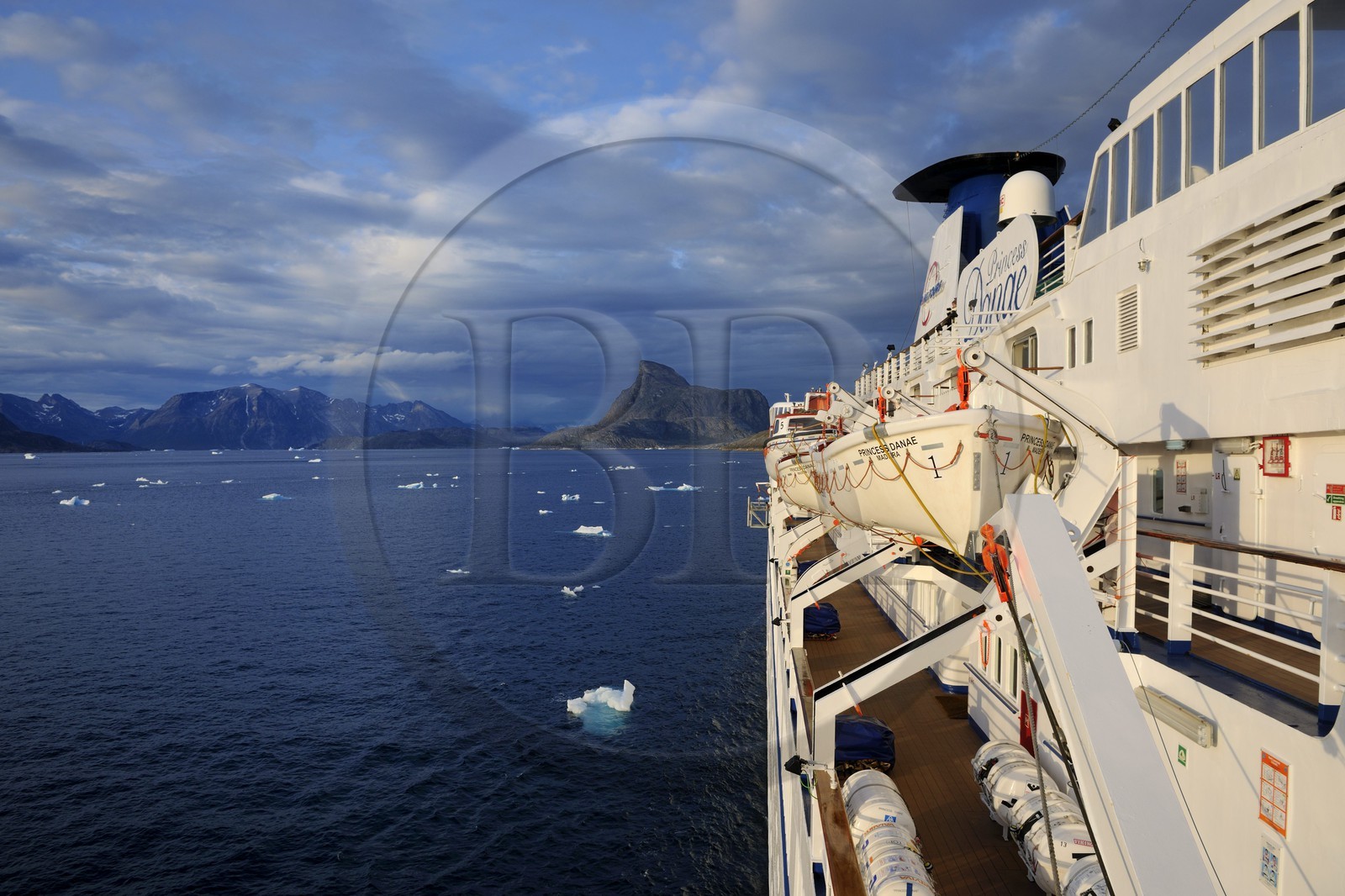Greenland, Nanortalik Fjord, Princess Danae cruise ship moving between the icebergs