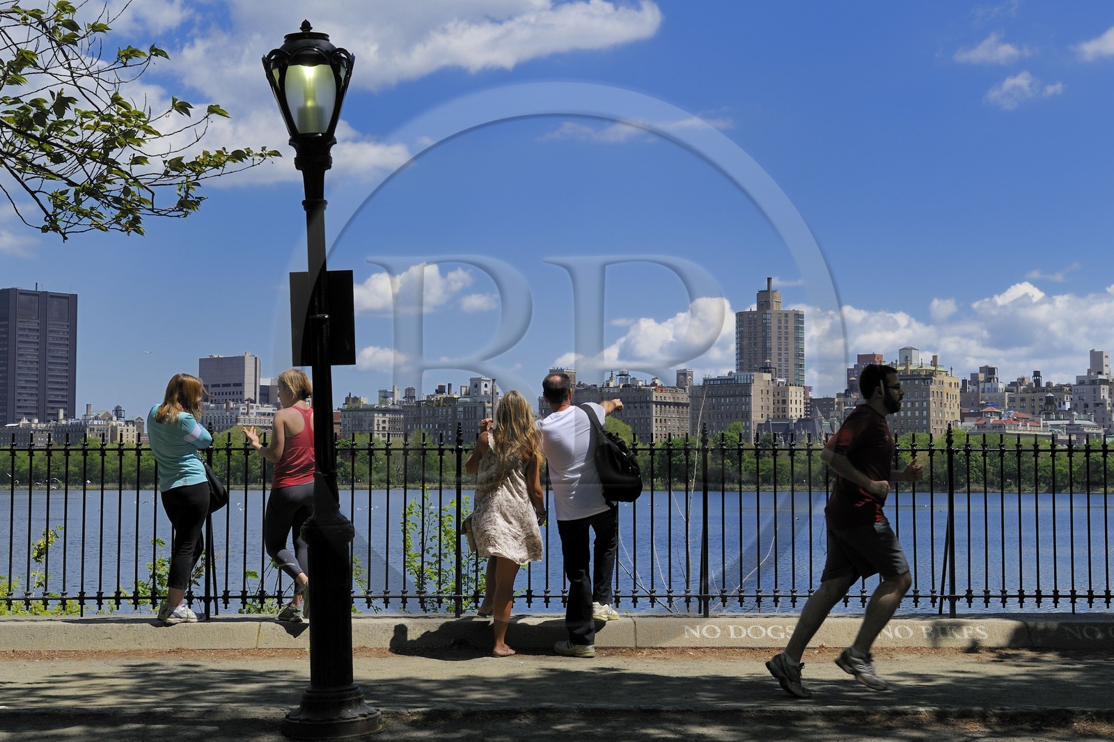 United States, New York City, Manhattan, Central Park, jogging around the Reservoir surrounded by skyscrapers