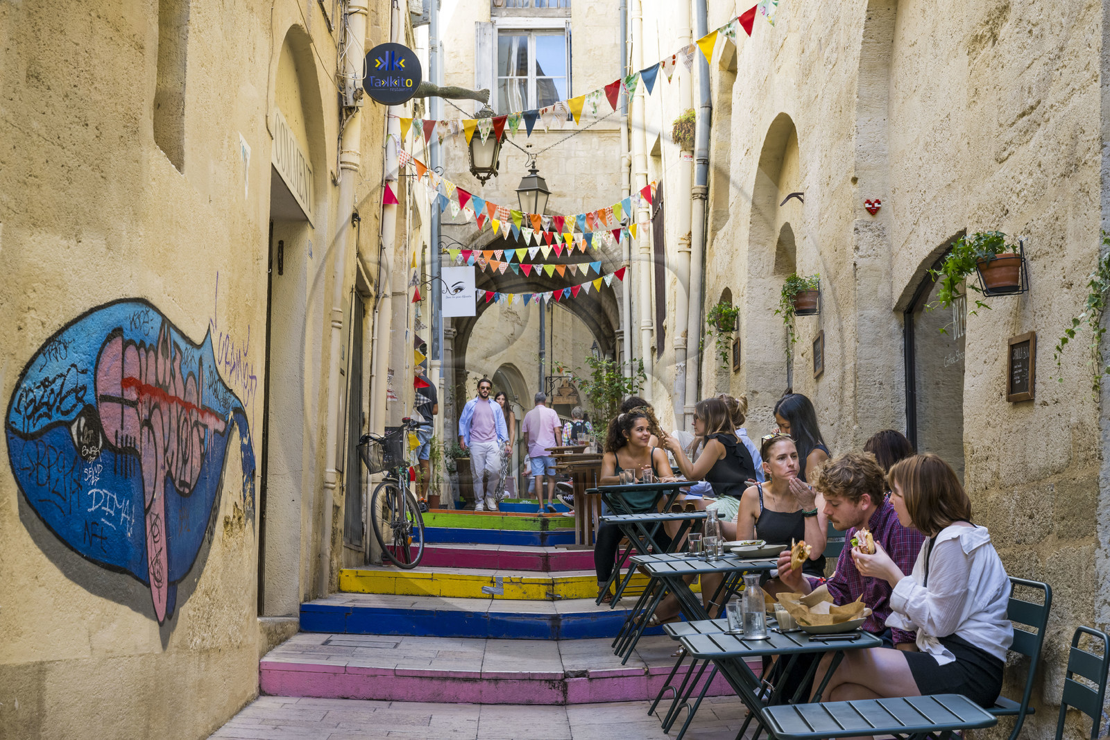 France, Herault, Montpellier, historic center called the Ecusson, rue du Bras de Fer with its risers painted in street art