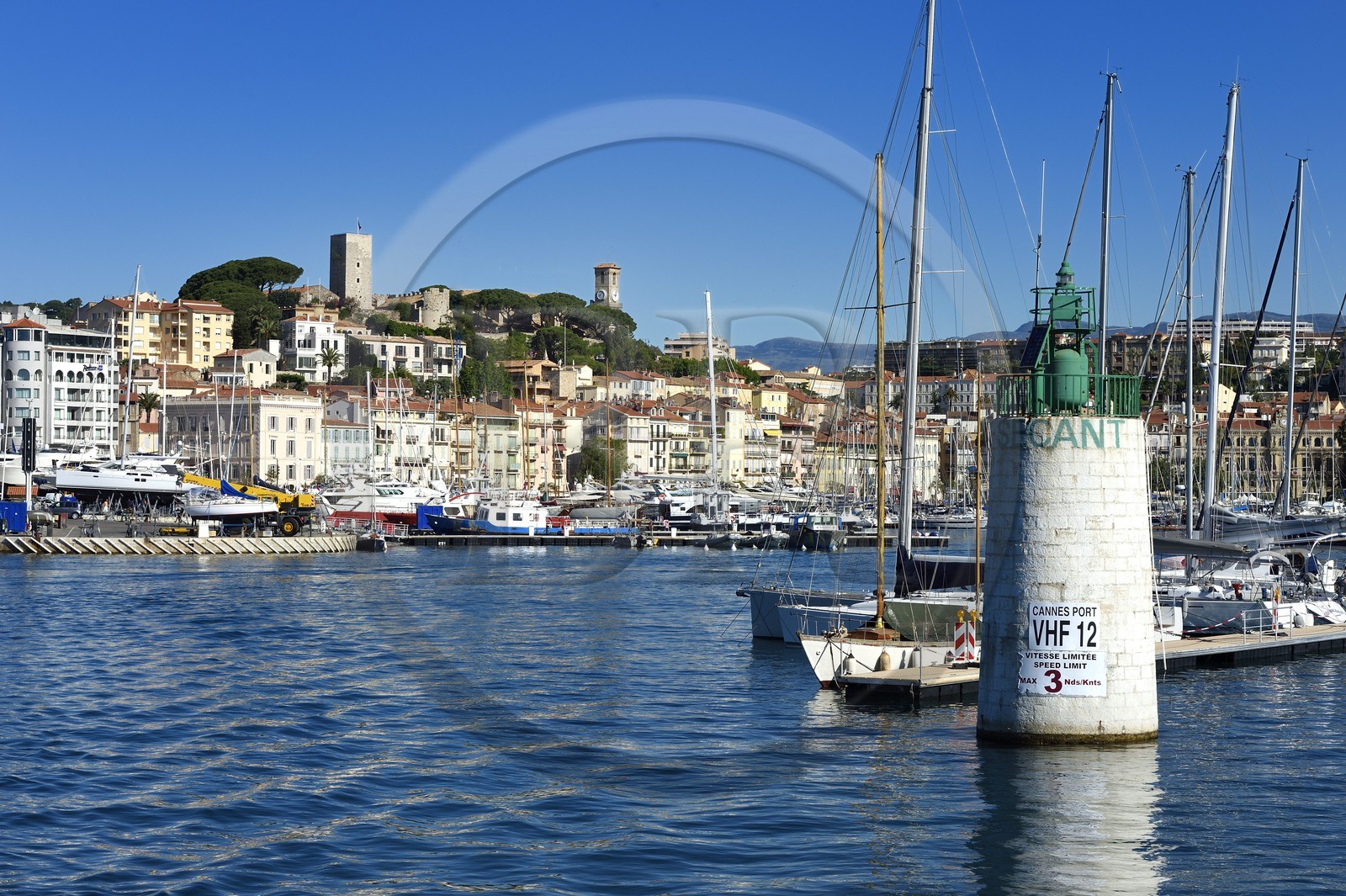 France, Alpes-Maritimes, the old town in Le Suquet district overlooking the port, at its peak the Tour du Suquet and the steeple of the Notre-Dame-de-l'Esperance church