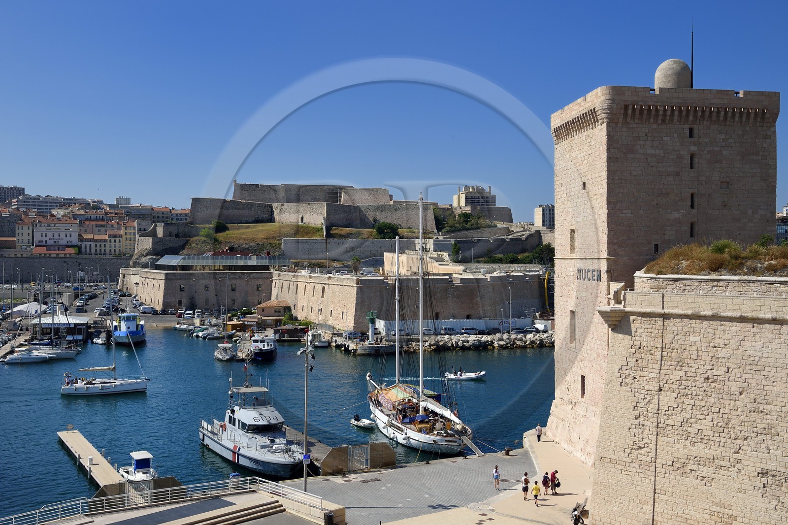 France, Bouches du Rhone, Marseille, the Fort Saint Jean at the Vieux Port entrance and the Fort Saint Nicolas in the background
