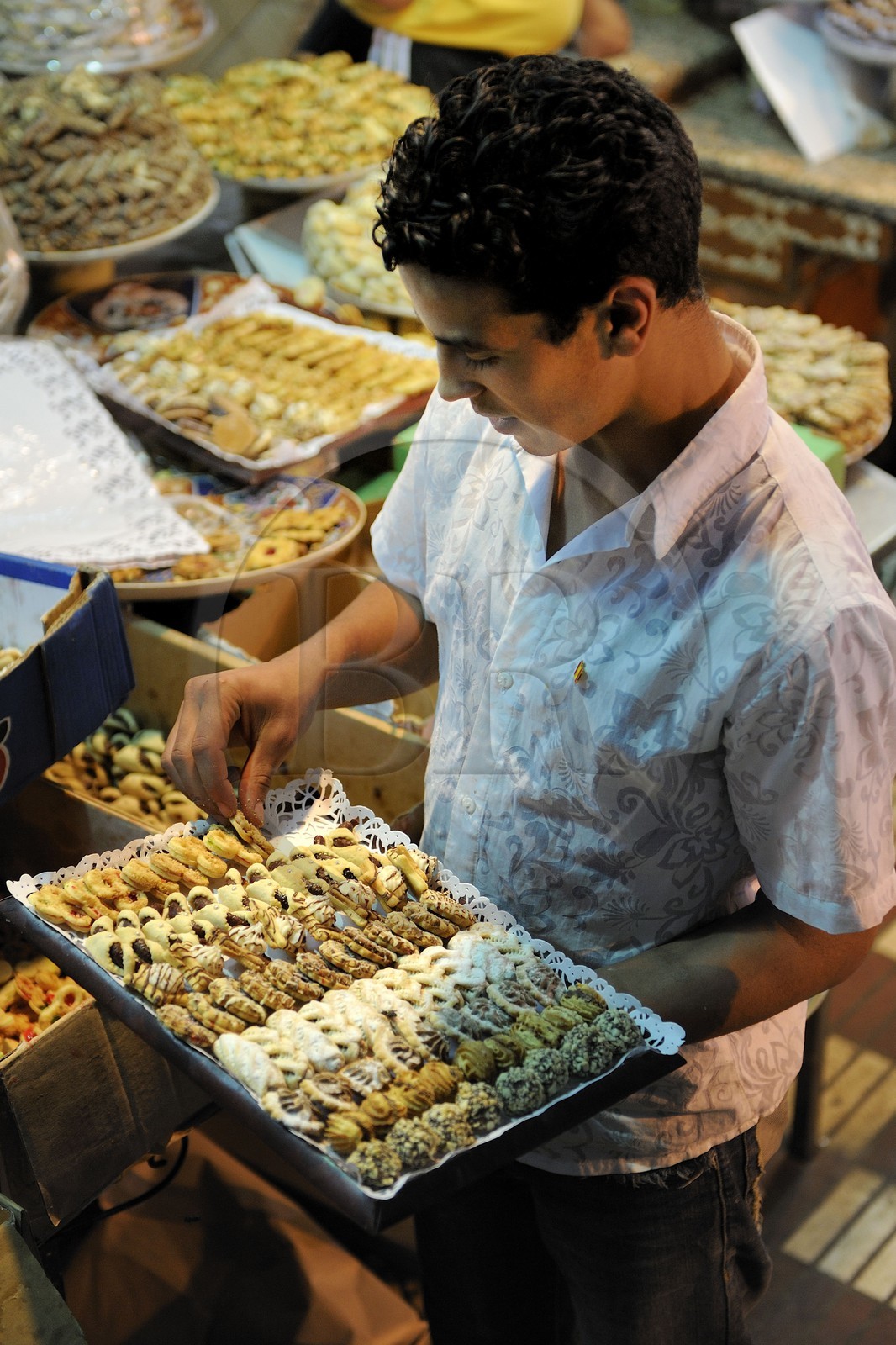 Morocco, Meknes Tafilalet Region, Meknes, Imperial City, medina listed as World Heritage by UNESCO, El Hedime covered market, stalls with pastries