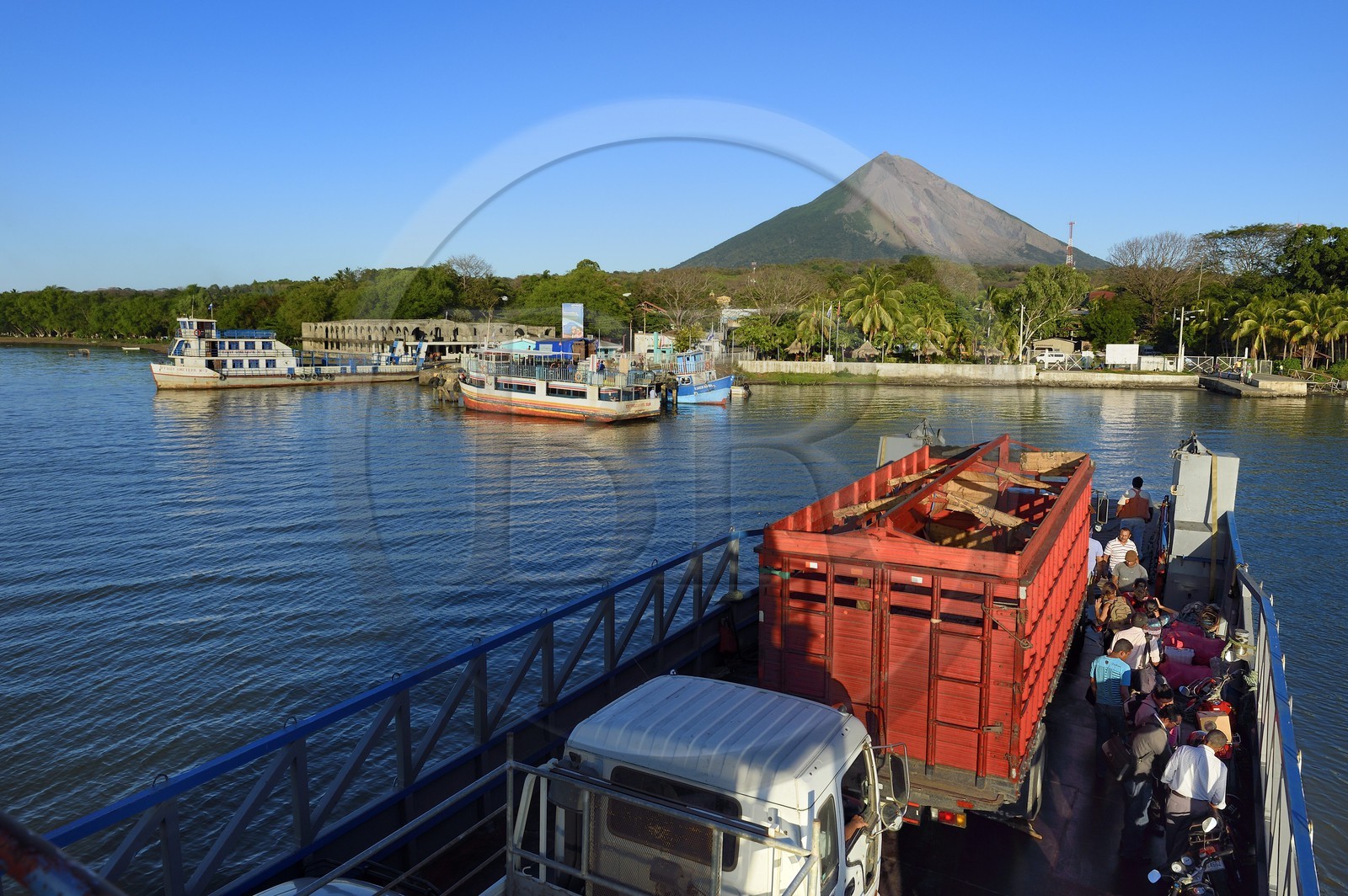 Nicaragua, Ometepe Island in Lake Nicaragua, ferry arrival at Moyagalpa harbour with the Conception volcano (1610 m) still active in the background