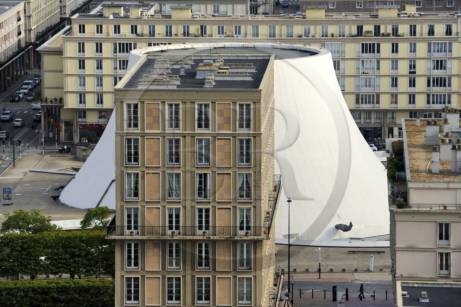 France, Seine Maritime, Le Havre, Downtown rebuilt by Auguste Perret listed as World Heritage by UNESCO, Perret buildings in front of the cultural center called Volcano created by Oscar Niemeyer