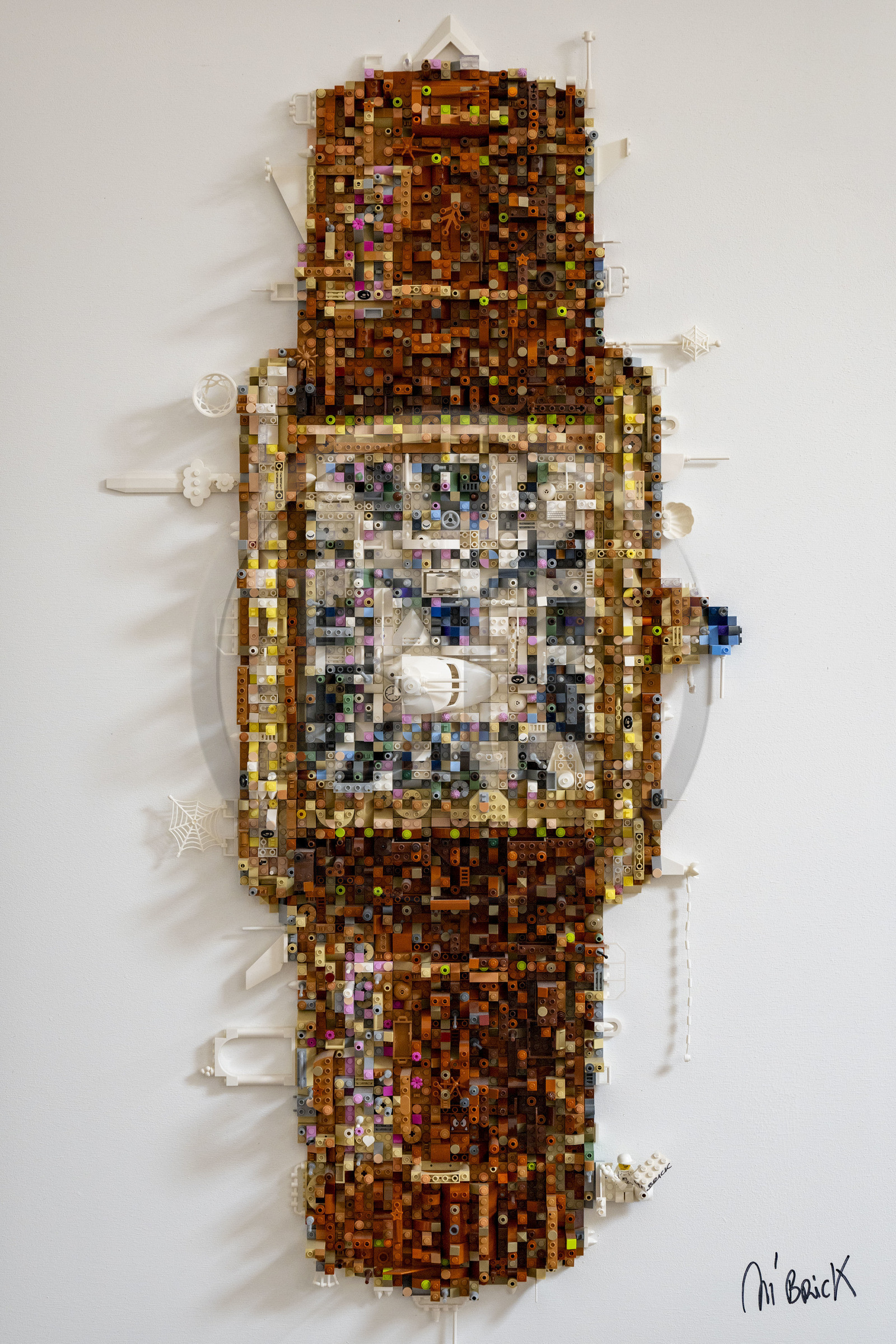 France, Cote d'Or, Dijon, Artist Aymeric Gillet, aka M'Brick, in his studio filled with crates of multicolored Lego used to create giant pixelated paintings inspired by pop culture