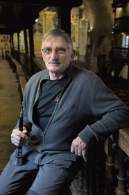 France, Pyrenees Atlantiques, Basque Country, Saint Etienne de Baigorry, Saint-Etienne (St. Stephen's) Church, Betti Bidart, Navarre gaita player (dual-hip wind instrument) also known as Basque flute