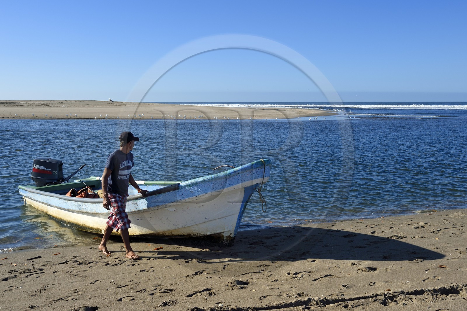 Nicaragua, the Pacific coast of Leon, Isla Juan Venado Nature Reserve, Las Penitas beach, fishing boat