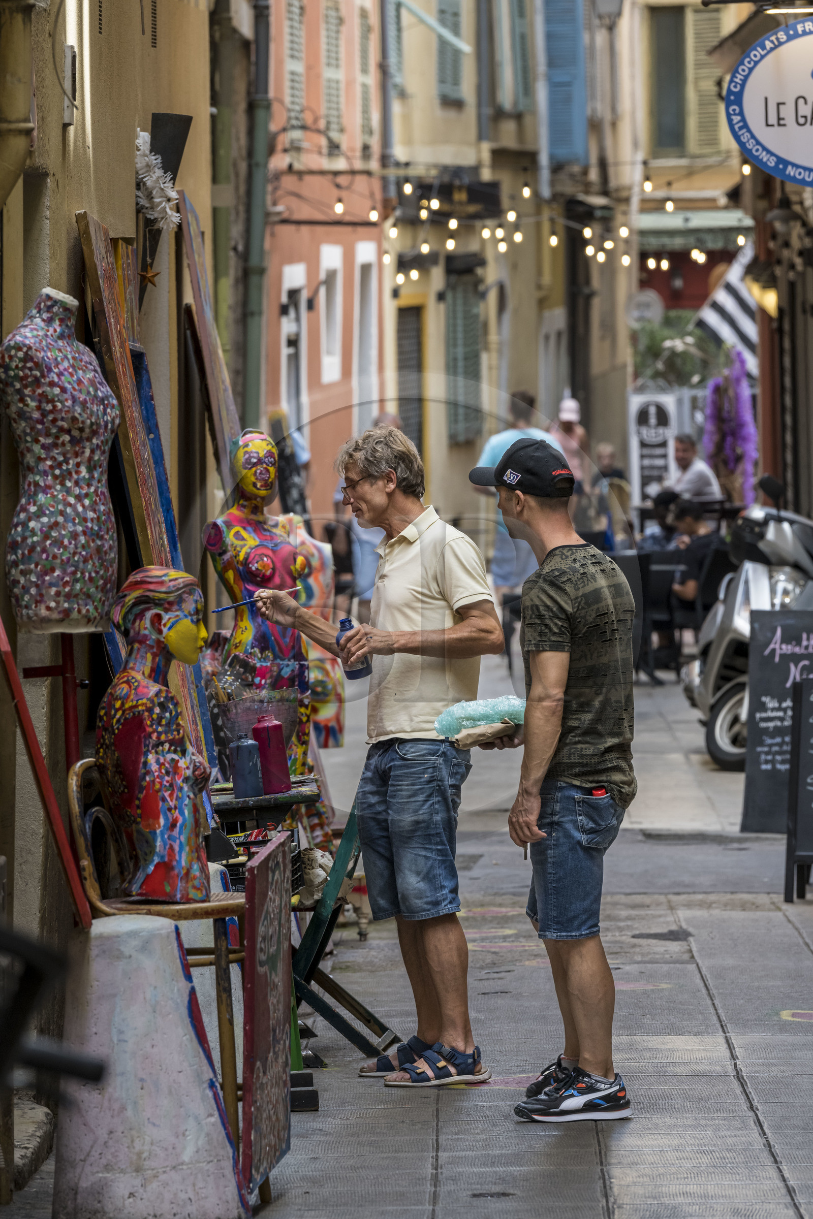 France, Alpes-Maritimes, Nice, listed as World Heritage by UNESCO, Old Nice, the painter Paulin Nikolli exhibiting his work in the rue Place Vieille