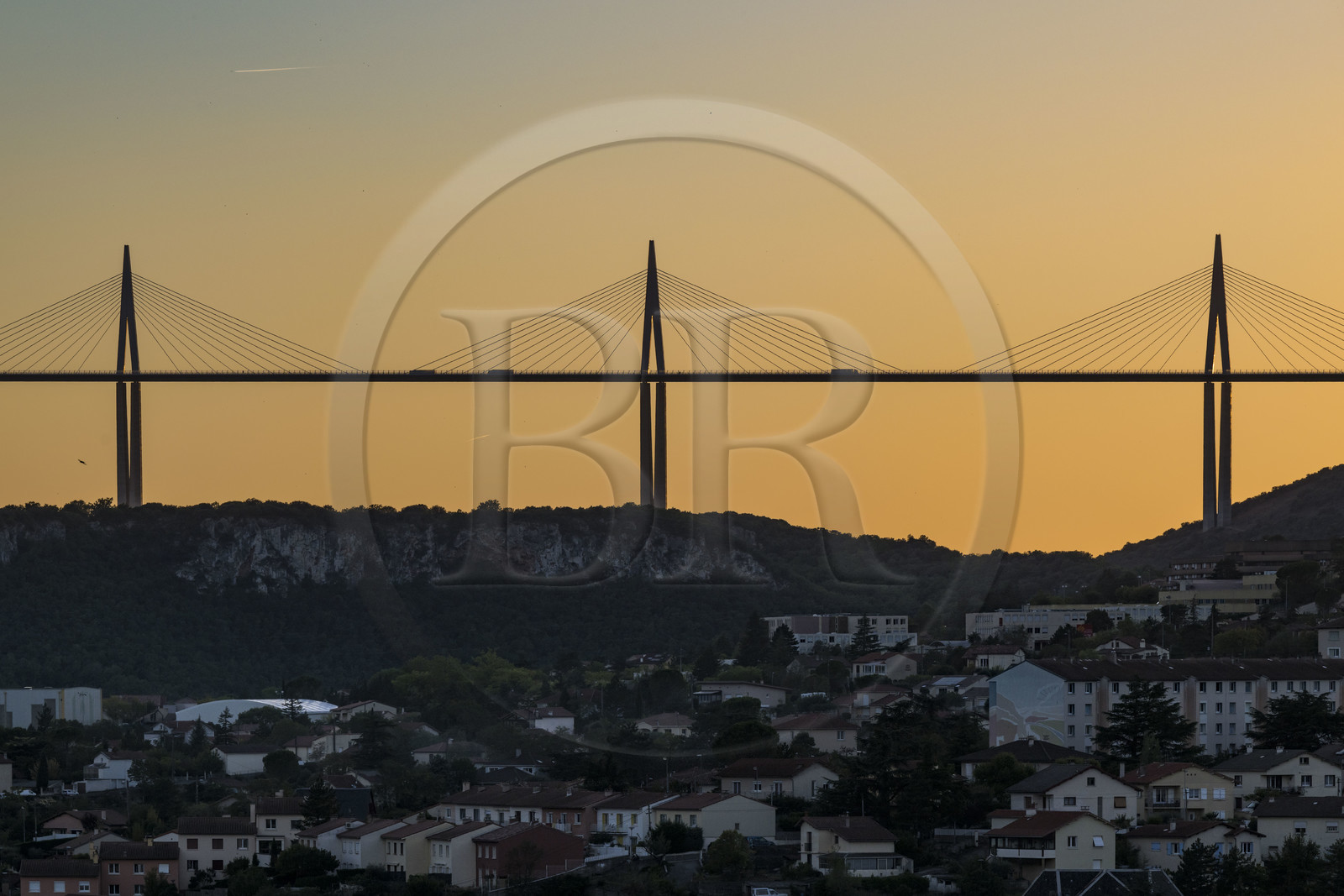 France, Aveyron, Grands Causses regional natural park, Millau city and the Millau viaduct by architects Michel Virlogeux and Norman Foster in the background