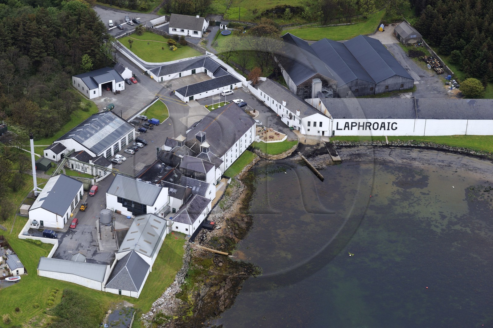 United Kingdom, Scotland, Inner Hebrides, Islay Island, Port Ellen, Laphroaig Scotch whisky distillery (aerial view)