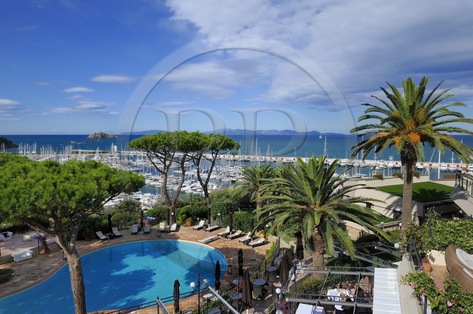 Italy, Tuscany, marina of Punta Ala from the Relais & Chateaux hotel Cala del Porto and the Island of Elba in the background