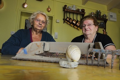 France, Manche, Bay of Mont Saint Michel, old harbour of Genets, the Coquetieres, a local name of women who pick up cockles, Renee Neveu and Marie Gesmier