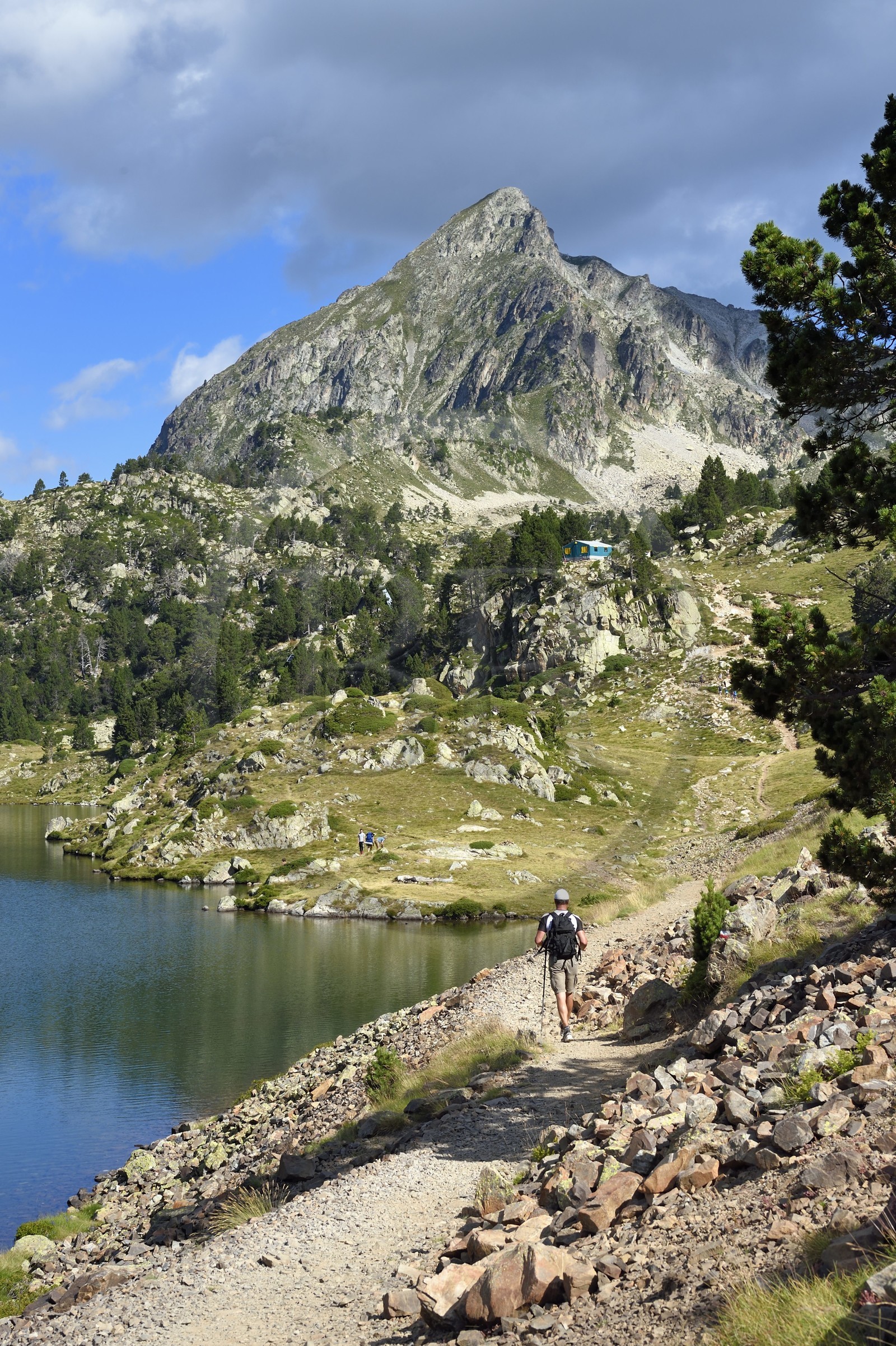France, Hautes Pyrenees, Saint Lary Soulan and Vielle-Aure, hike on a variant of the GR10 between the Portet pass and the Bastan lakes on the edge of the Neouvielle nature reserve, middle Bastan lake and the Pic de Bastan in the background