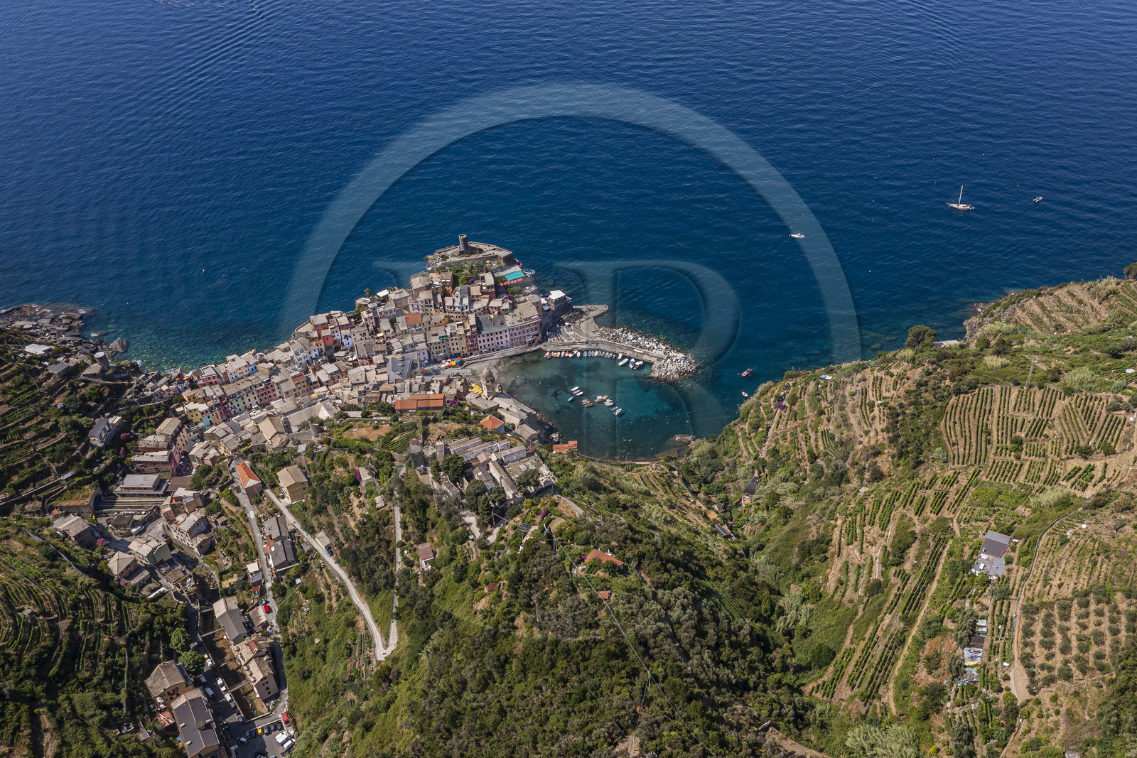 Italy, Liguria, Cinque Terre National Park listed as World Heritage by UNESCO, village of Vernazza and its port (aerial view)