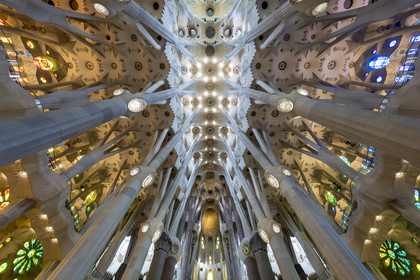Spain, Catalonia, Barcelona, Eixample district, Sagrada Familia basilica by Catalan modernist architect Antoni Gaudi, listed as a UNESCO World Heritage Site, the choir and the vault of the Nave at the top