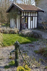 France, Marne, village of Saint-Amand-sur-Fion, old washhouse on the Fion river in the garden
