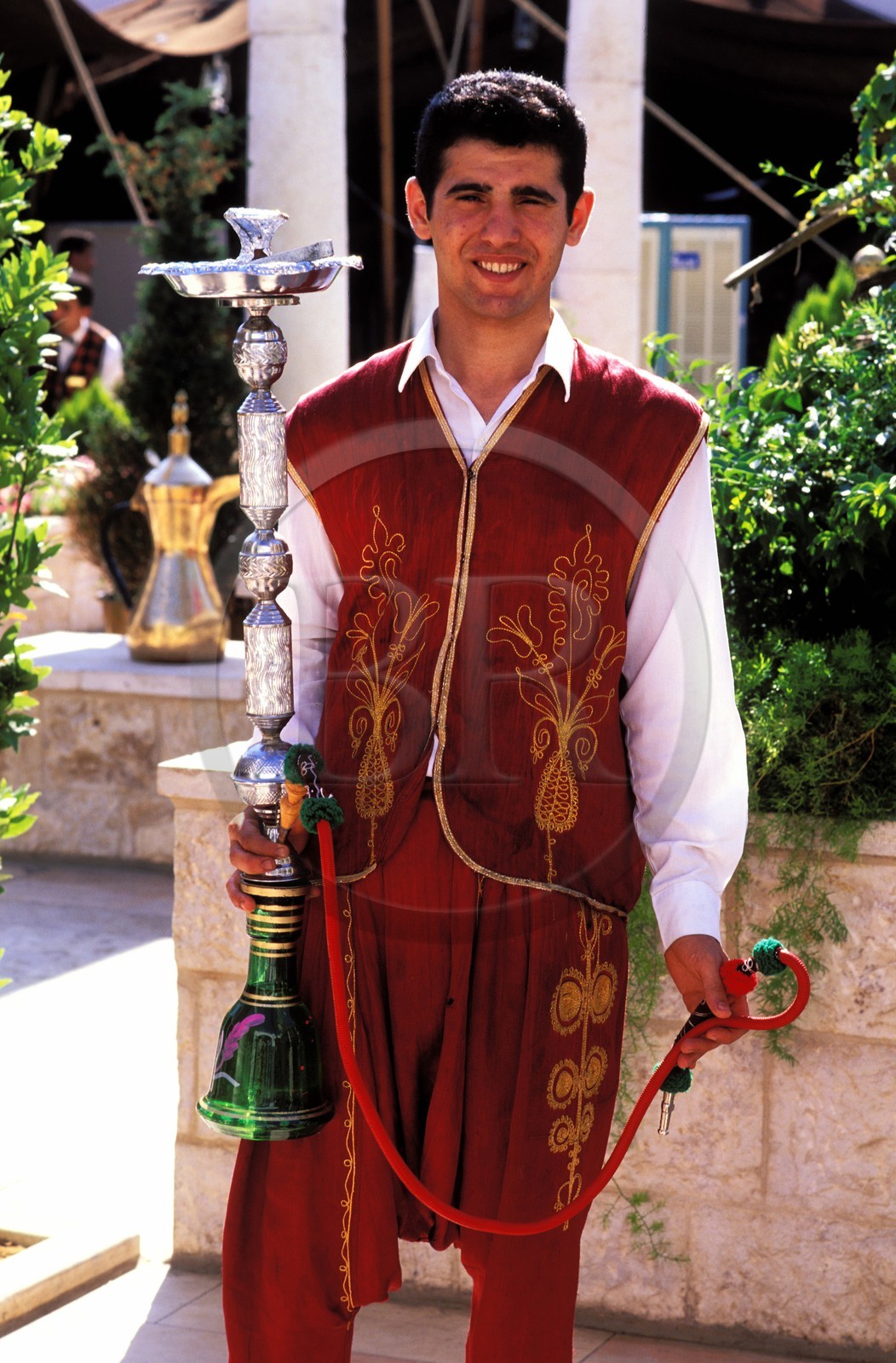 Jordan, Amman, Reem Albawady restaurant, waiter of water pipe