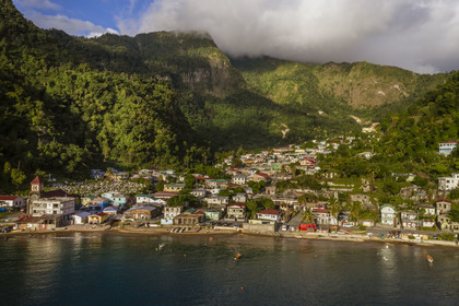 Caribbean, Dominica Island, Soufriere Bay, the beach and the village of Soufriere (aerial view)