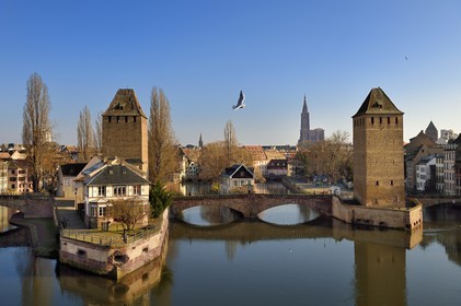 France, Bas Rhin, Strasbourg, old town listed as World Heritage by UNESCO, Petite France District, defensive towers of the covered bridges and Notre-Dame cathedral in the background