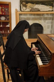 Croatia, Dalmatia, Dalmatian Coast, Sibenik, Convent of St. Lucia (samostan sv. Luce), Sister Fortunata at the piano