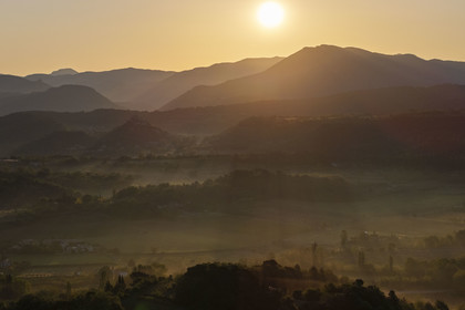France, Vaucluse, Dentelles de Montmirail mountains, Crestet, the plain north of Malaucène at sunrise (aerial view)