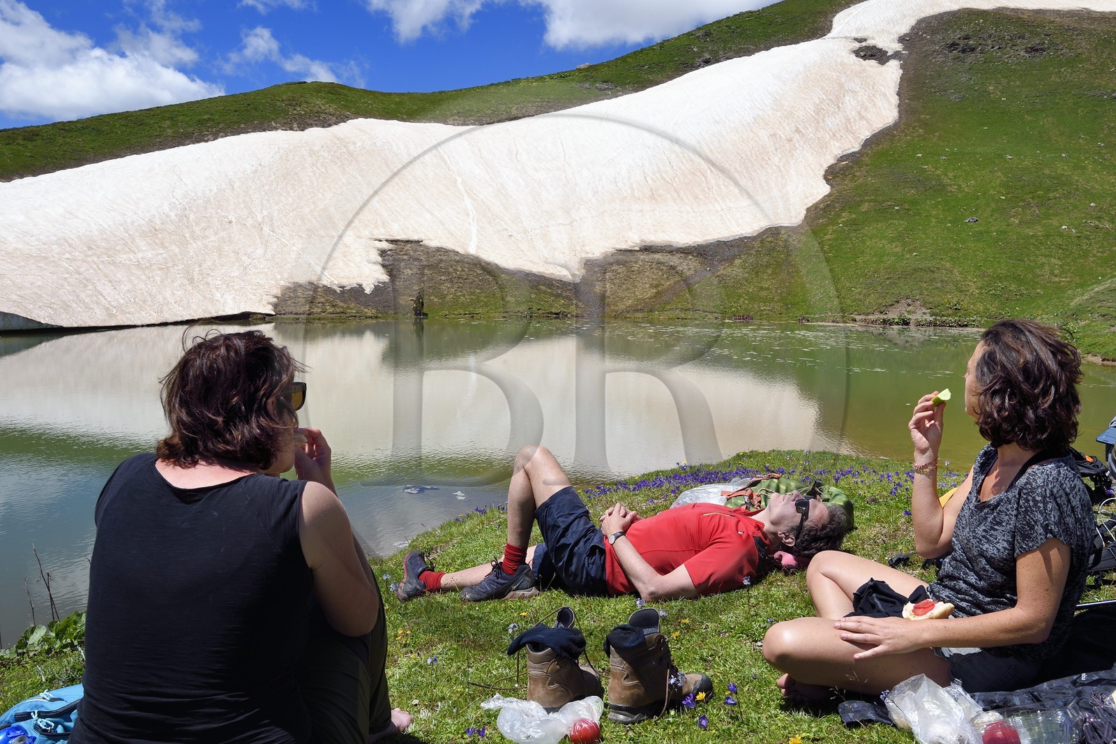 Georgia, Upper Svaneti (Zemo Svaneti), Mestia, hikers on the Koruldi Lake on the foothills of Mount Ushba
