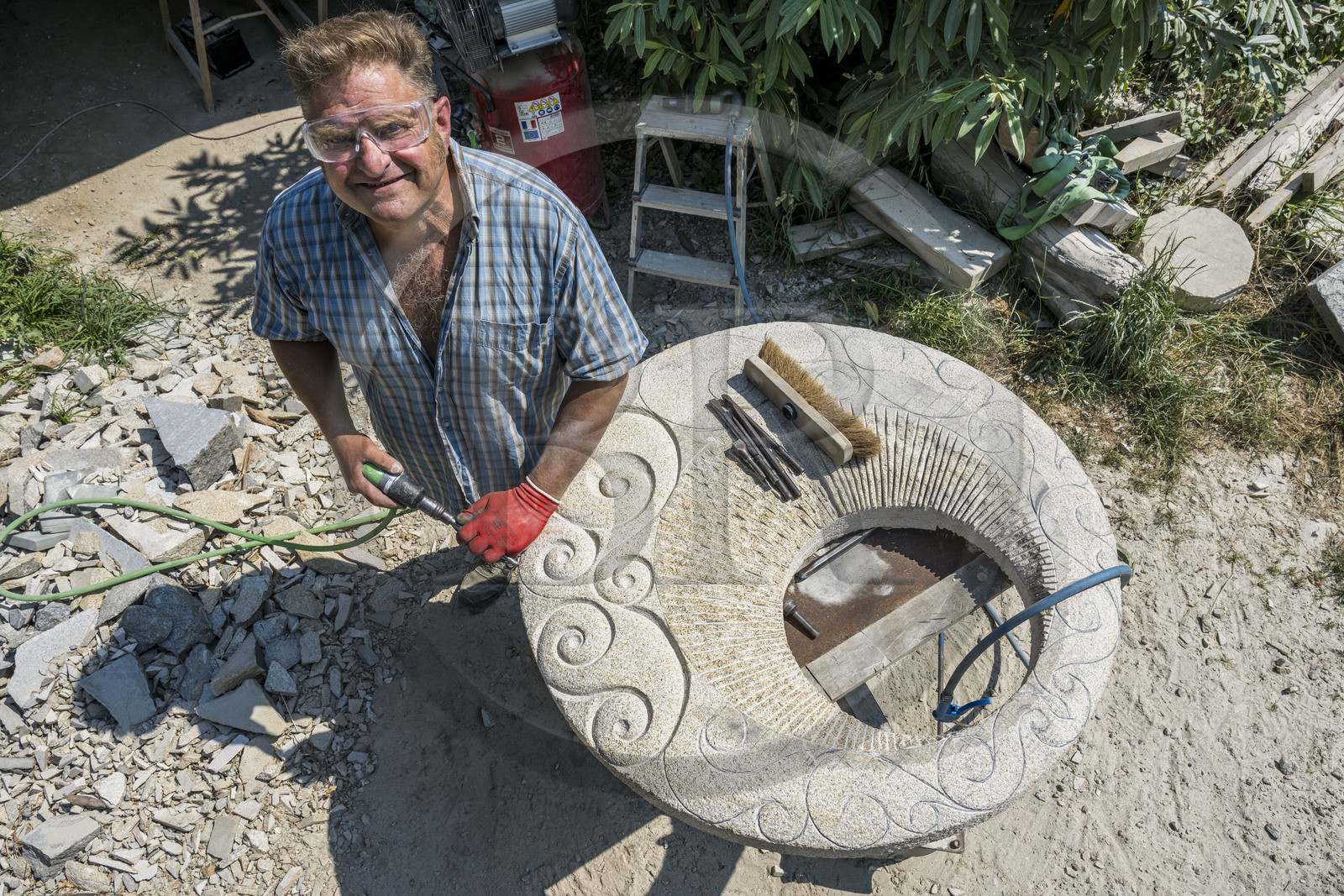 France, Morbihan, Locoal-Mendon, the sculptor and stonemason Gueho Patrick